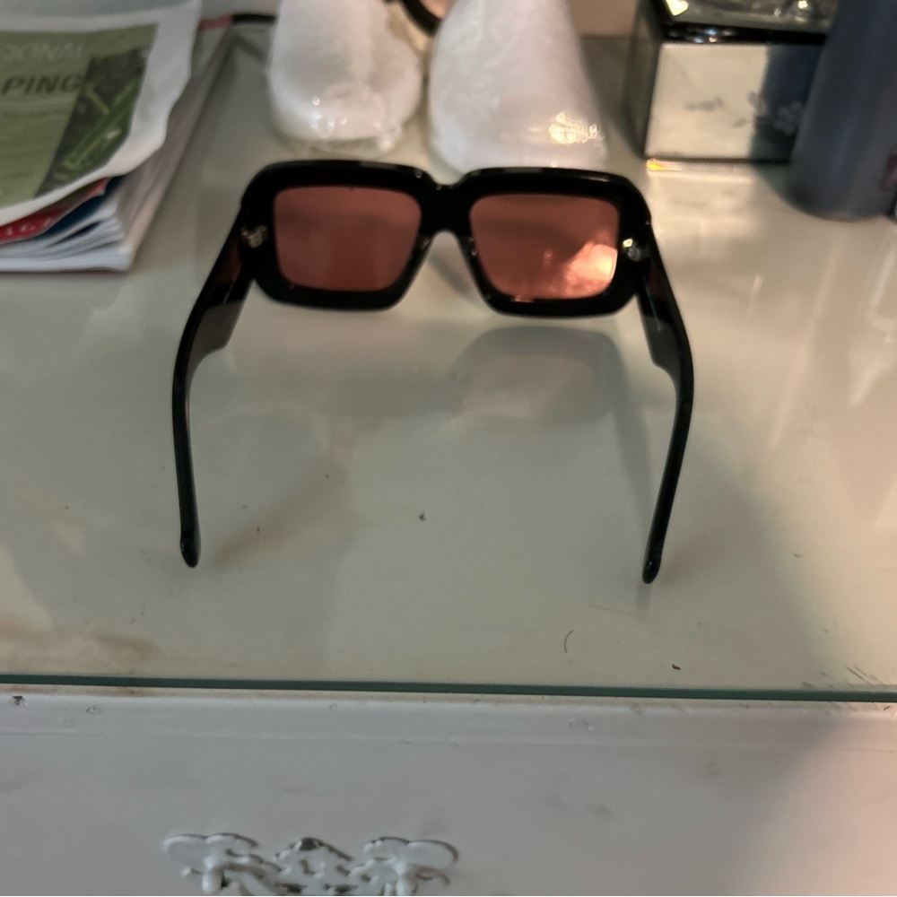 Black Sunglasses with Red Lenses